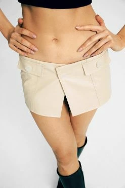 SOLADO Low Waist Button Front PU Leather Mini Skirt